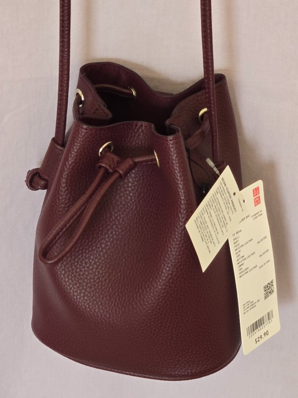 UNIQLO Faux Leather Drawstring Mini Shoulder Bag - Picture 1 of 14